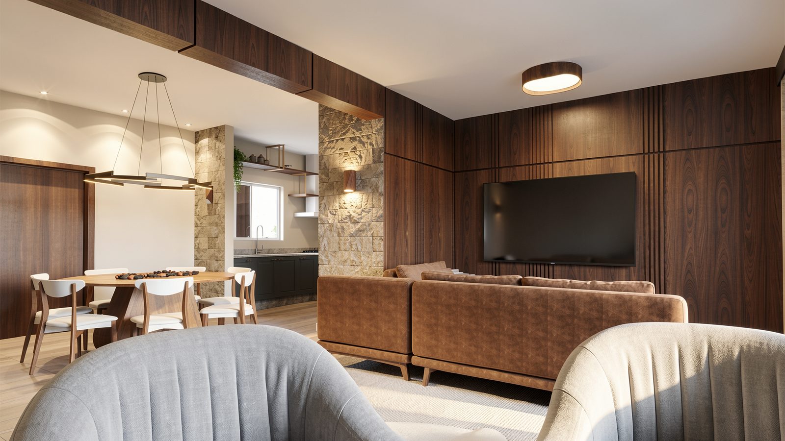 Sala de estar planejada com painel de TV e marcenaria em madeira